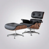 Mid-century modern lounge chair and ottoman with black leather and wood shell, chrome base