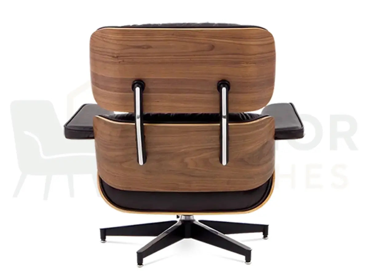 Elevate your interior décor with a walnut wood lounge chair replica upholstered in chocolate brown leather, engineered with a sturdy black frame for lasting stability.
