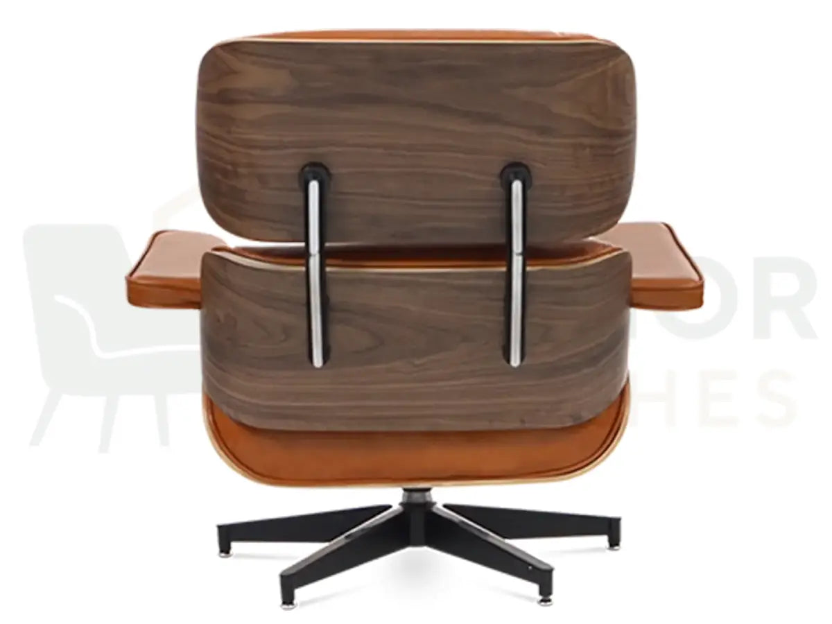 Bring authentic mid-century character into your home with a walnut wood lounge chair replica upholstered in tan brown leather and strengthened by a powder-coated black frame.