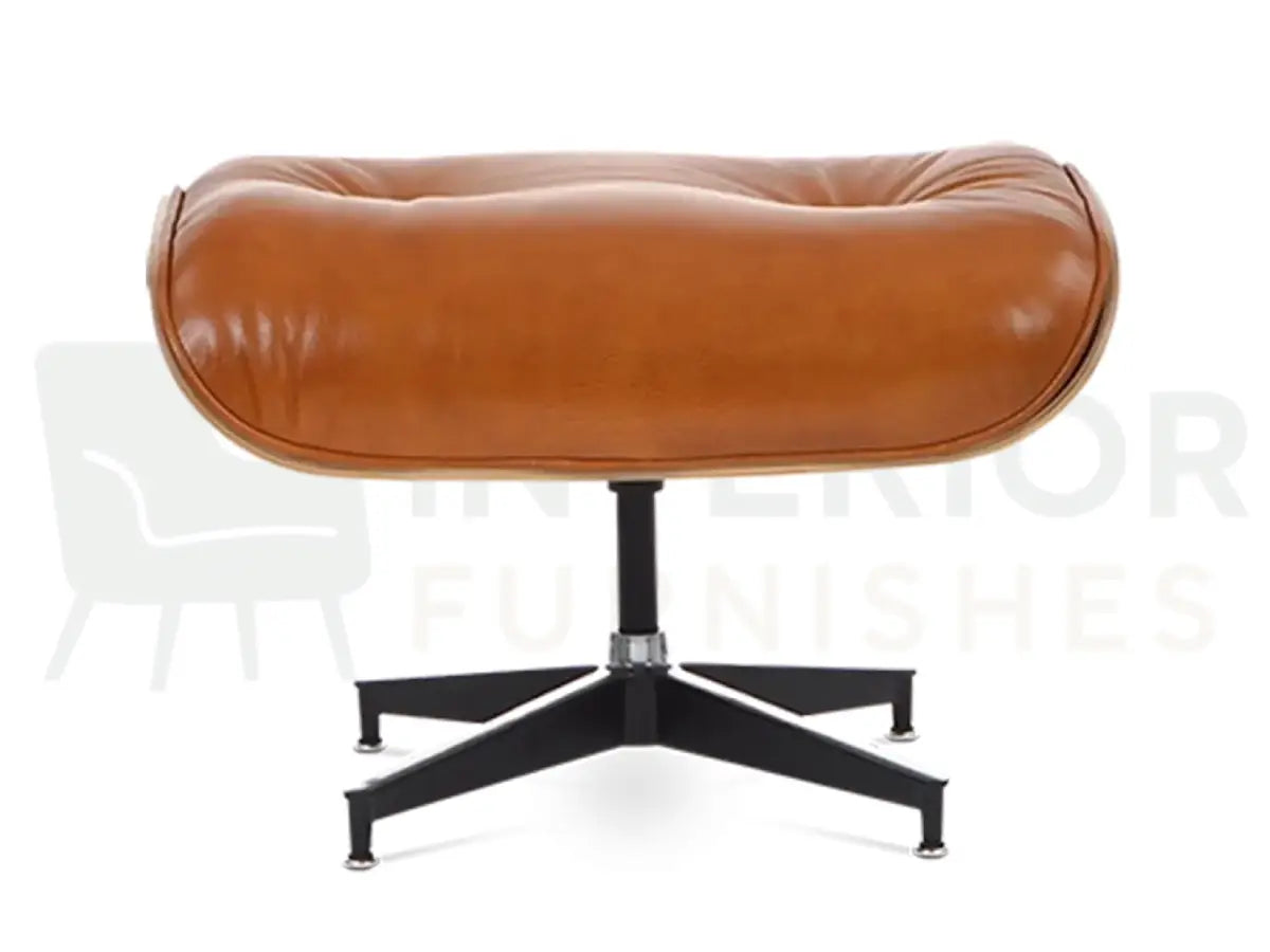 Interior designers appreciate this premium walnut veneer lounge chair replica for its elegant tan leather finish, supportive seating and durable black base, available from Interior Furnishes starting at £799.
