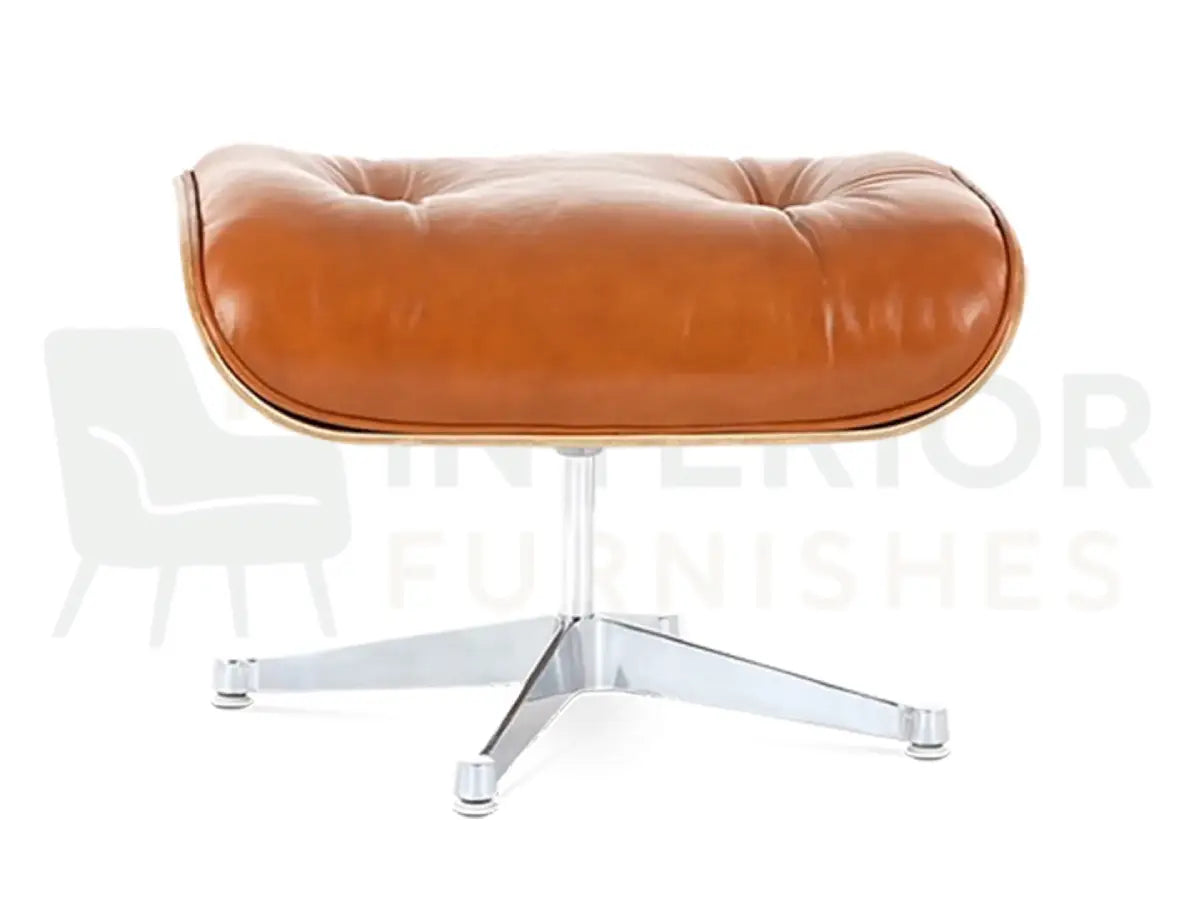 Expertly crafted for comfort and timeless appeal, this walnut wood Eames lounge chair replica showcases premium tan brown leather, a chrome base and delivery across the UK, EU and USA by Interior Furnishes starting at £799.