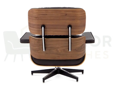 Elevate your interior décor with a walnut wood lounge chair replica upholstered in chocolate brown leather, engineered with a sturdy black frame for lasting stability.