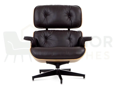 Premium walnut grain, soft brown leather and a powder-coated black base make this designer lounge chair replica a stylish addition to homes, offices and boutique hotels.