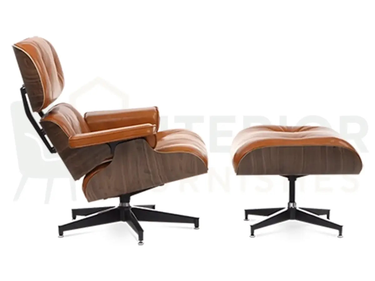 Handcrafted for everyday comfort, this walnut lounge chair replica features soft tan brown leather cushions, ergonomic support and a matte black base built for long-lasting stability.