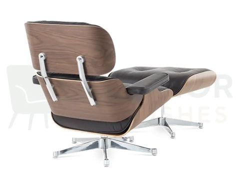 Classic walnut craftsmanship meets contemporary chrome styling in this lounge chair replica, wrapped in premium chocolate brown leather for exceptional comfort.