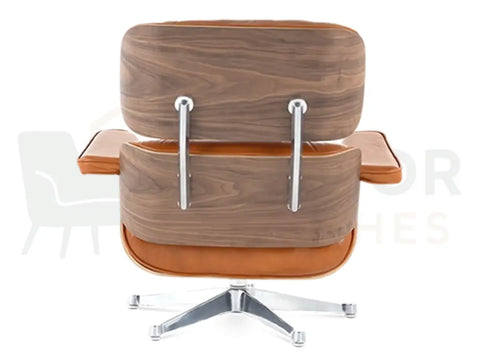 Create a welcoming atmosphere with a walnut wood lounge chair replica featuring saddle tan leather upholstery and chrome detailing, offered by Interior Furnishes from £799.
