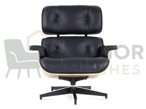 A black leather lounge chair with tufted back and seat cushions, light wood armrests, and a black five-star swivel base, shown against a white background with a faint watermark.