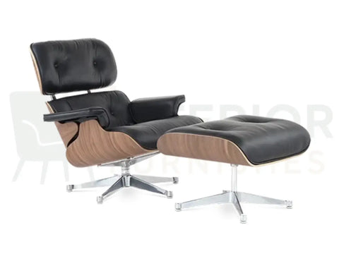 Polished chrome detailing enhances this walnut wood Eames lounge chair replica, upholstered in premium black leather and available for customers across the UK, Europe and USA.