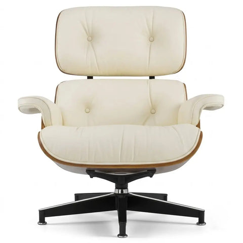 An iconic mid-century modern lounge chair with cream-colored tufted leather upholstery and a black five-star metal base, shown against a plain white background.