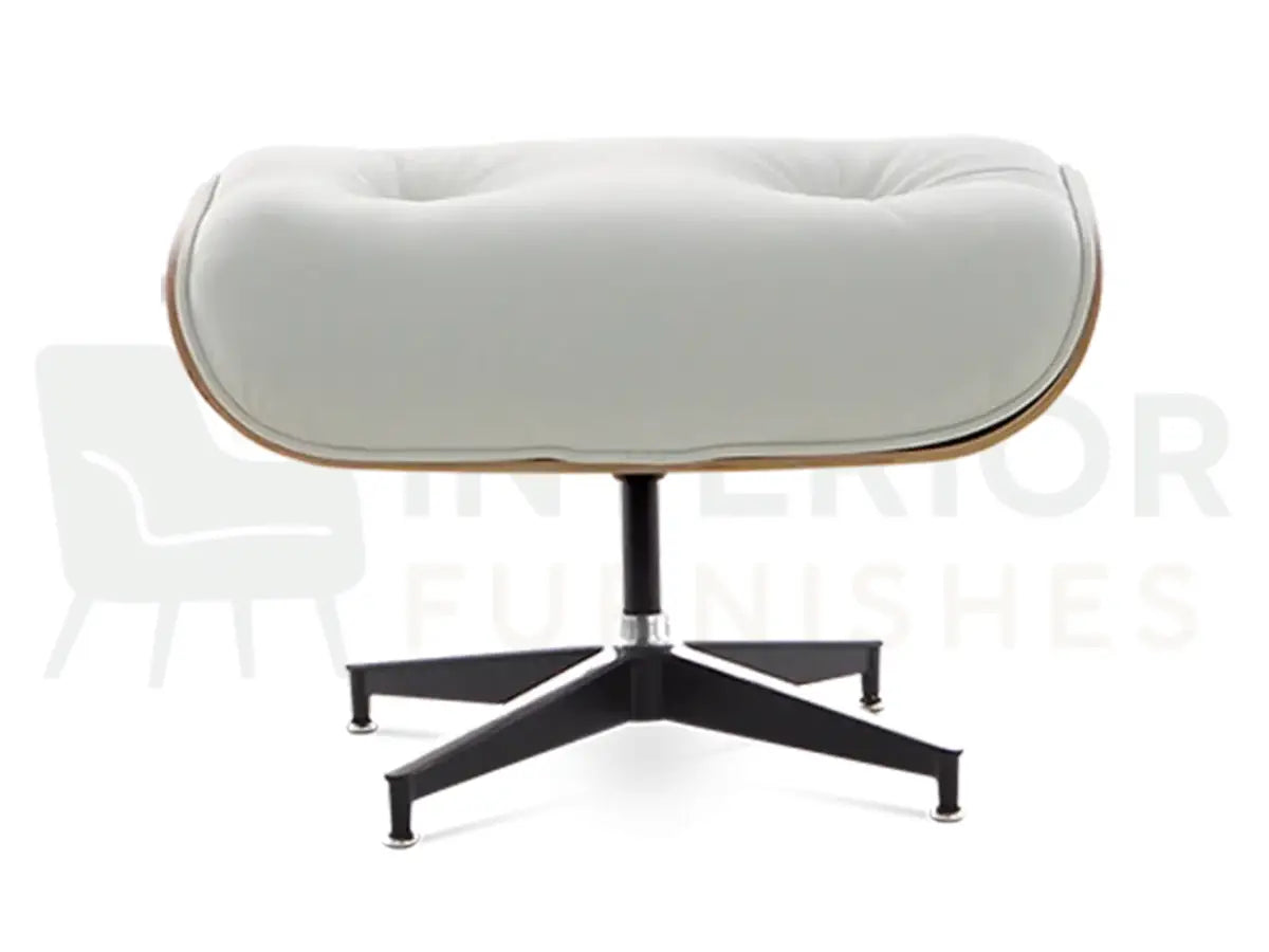 Modern interior designers choose this walnut wood lounge chair replica for its elegant white leather finish, ergonomic seating position and contemporary black support base.