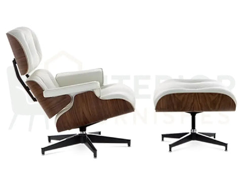 Create a clean Scandinavian-inspired space with a handcrafted walnut lounge chair replica finished in white leather and supported by a durable black frame from Interior Furnishes.
