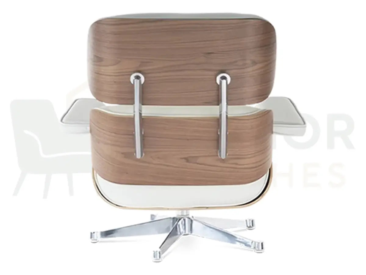 Perfect for contemporary penthouses and designer living rooms, this handcrafted lounge chair replica showcases white leather upholstery with a polished chrome structure.