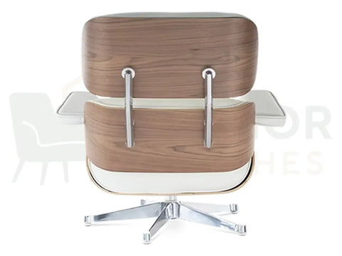 Perfect for contemporary penthouses and designer living rooms, this handcrafted lounge chair replica showcases white leather upholstery with a polished chrome structure.