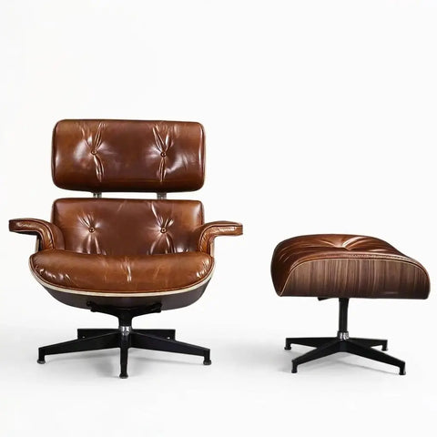 Eames Premium XL-versie Lounge Chair & Ottoman van notenhout met vintage lichtbruin gewaxed leer